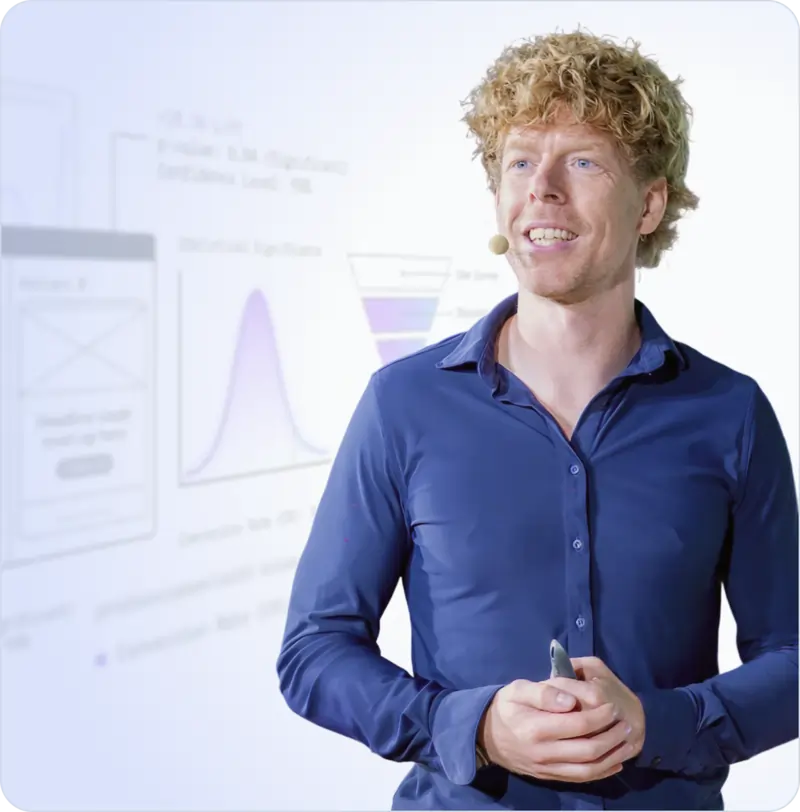 Ruben de Boer presenting in front of a whiteboard